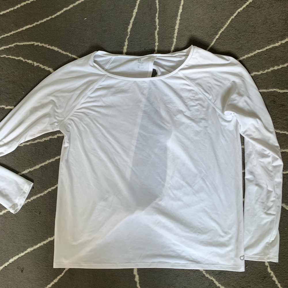 Lightweight white workout top with open back